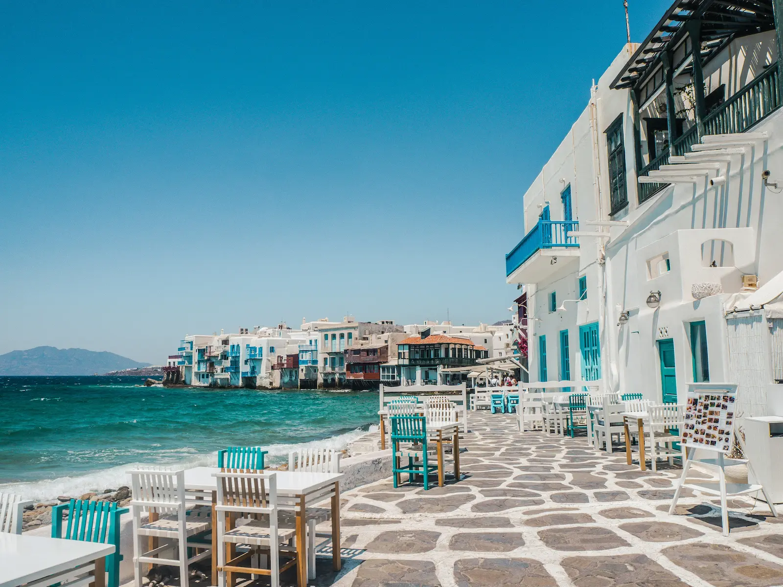 Mykonos luxury travel guide featuring Little Venice sea view with waterfront restaurants and iconic Cycladic architecture